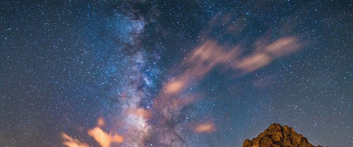This was an interesting and creepy night alone in the Ironwood Forest National Monument, well at least I think I was alone.. I knew that I wanted to get out last night to capture the Milky Way and couldn't think of anywhere to go, then I remembered that I wanted to go back to Ironwood with a little more time to do it right. I did get lucky and timed it almost perfectly and captured the vertical core over the mountain. But even though I captured this image and really enjoy the area I don't think I will be going back alone..
I don't have a 4x4 vehicle and could only make it so far up the trail with my vehicle. So, because of this I had to hike in a way to find a location to shoot before the sun set, passing a camp site on the way, which wasn't strange at the time. But once the sun set that place turned into something different, dark, and mysterious. Also, to top it off my phone died almost immediately after getting to this location. It was probably the animals and my imagination playing tricks on me, but I didn't want to stay out there too late and headed back to the car just after I captured this image.
On the way back I was all lights on and not really paying attention to anything other than enjoying the hike, that is until I passed that camp site again.. When I reached it, I realized that there were other tents that had been blown down and the place was basically abandoned. The main tent door been cut open and everything left behind. I did take a quick look to make sure everything was okay, and from the looks of it the Rangers had already been there, who knows what happened. But, that isn't something you want to pass in the middle of the desert, at night, by yourself, with no phone..
So, just remember if you ever go out alone let someone know where you are, tag yourself, and make sure you phone is fully charged, or you have a way to recharge it and stay safe!
#BvSAstro
