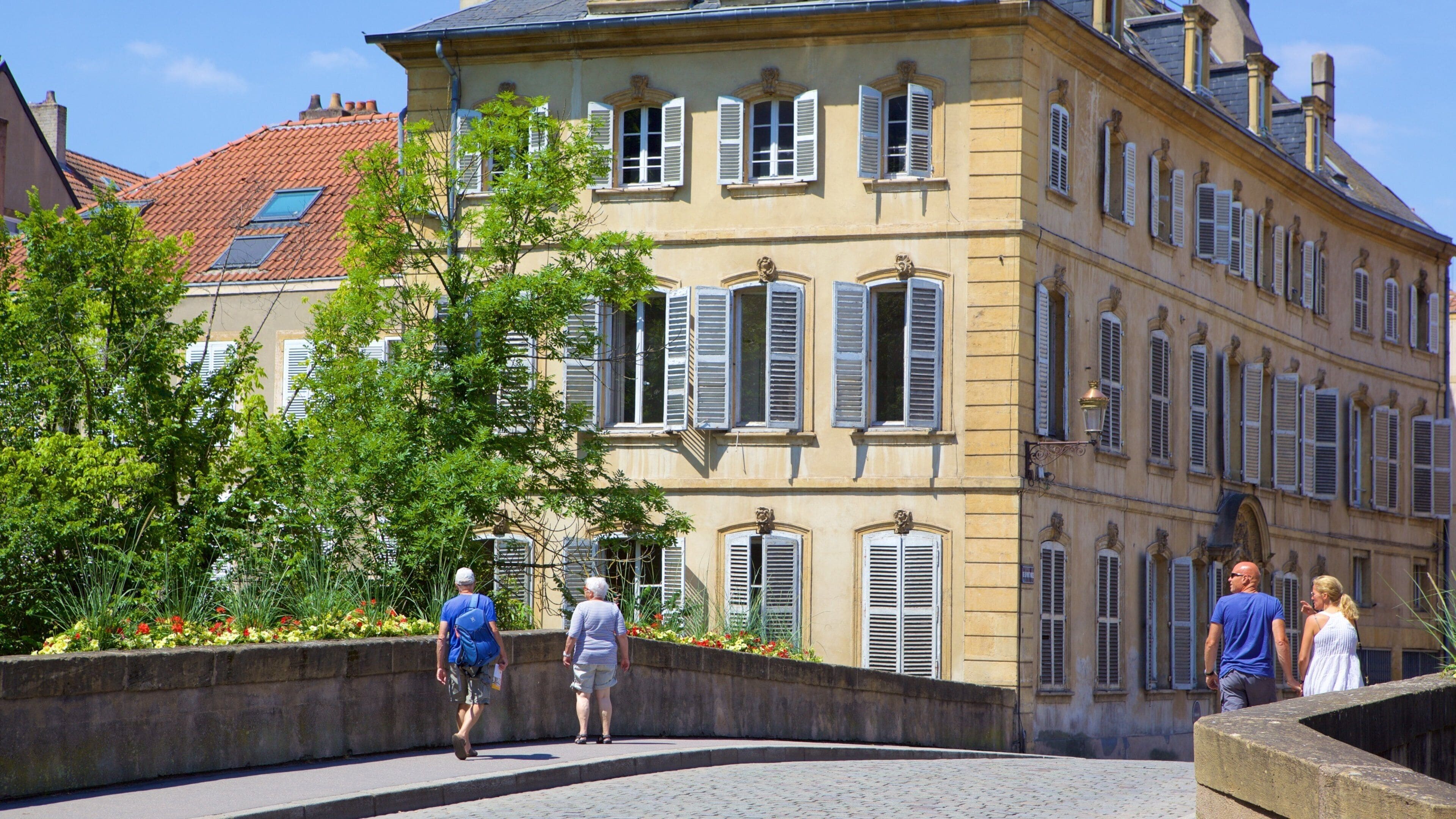 Metz which includes a bridge as well as a small group of people