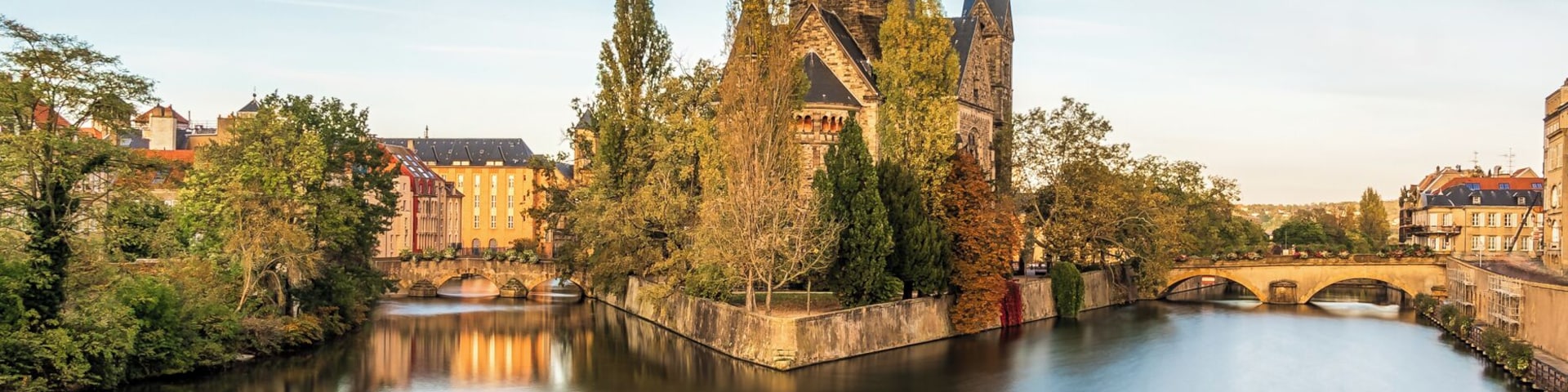 Here is a photo from a quick stop at the Metz. The French city along the Moselle and Seille rivers. I love this city full of water canals and historic buildings. Here is a slow exposure capture of one of the Temple Neuf decorating this beautiful city.