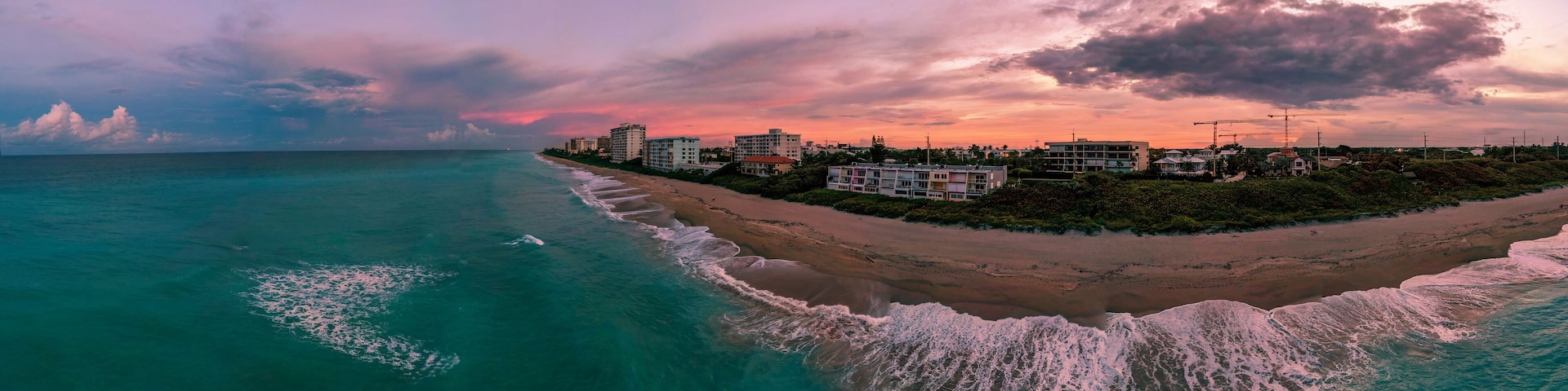 A colourful sunrise over Juno Beach, Florida, USA