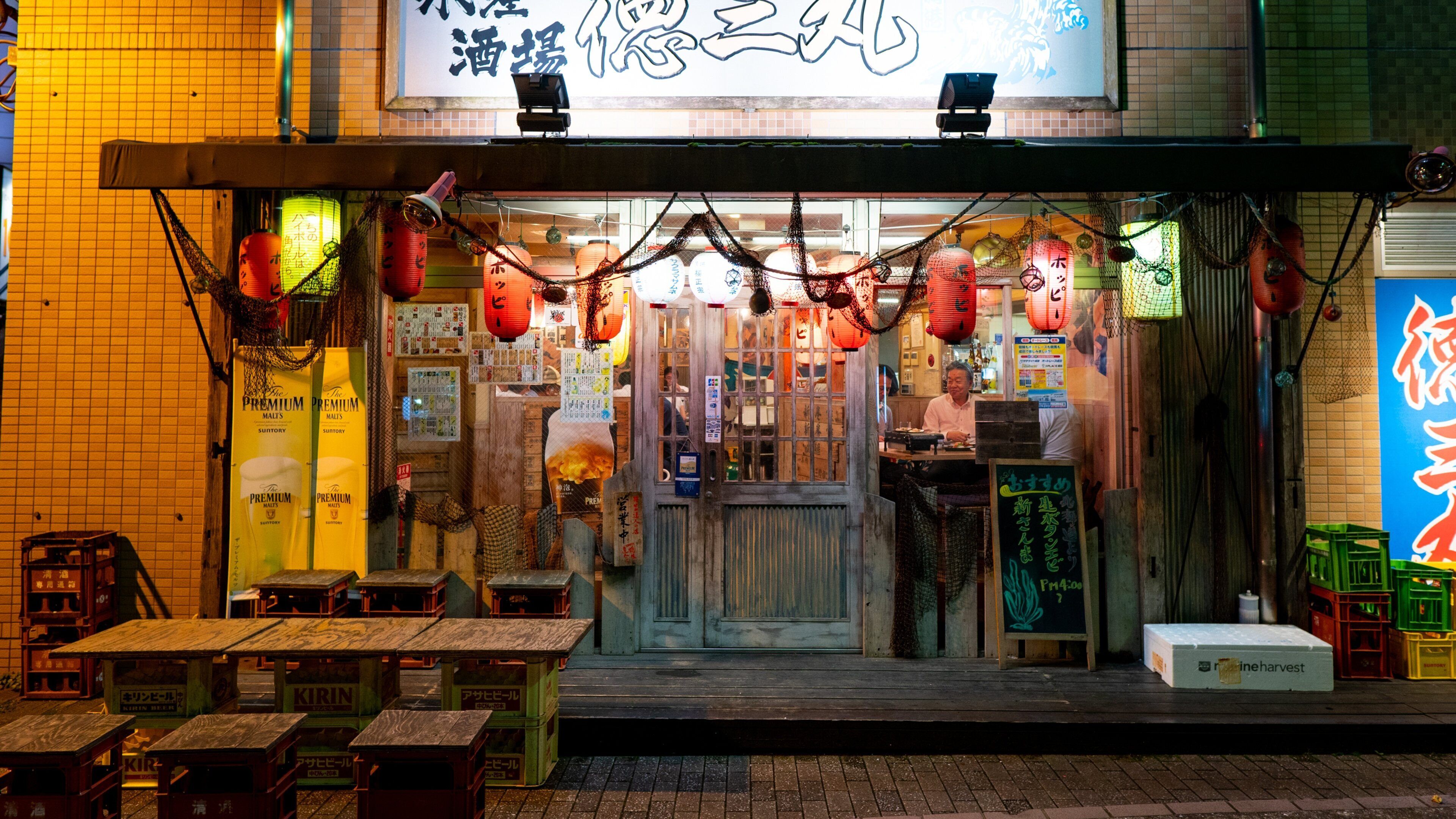 Narita featuring night scenes and signage