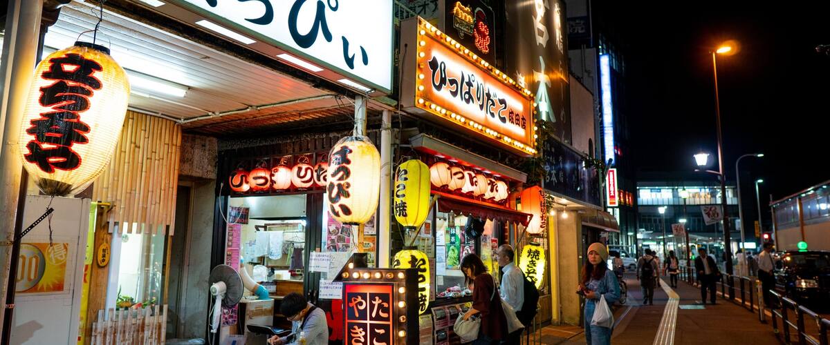 Narita which includes street scenes, signage and night scenes