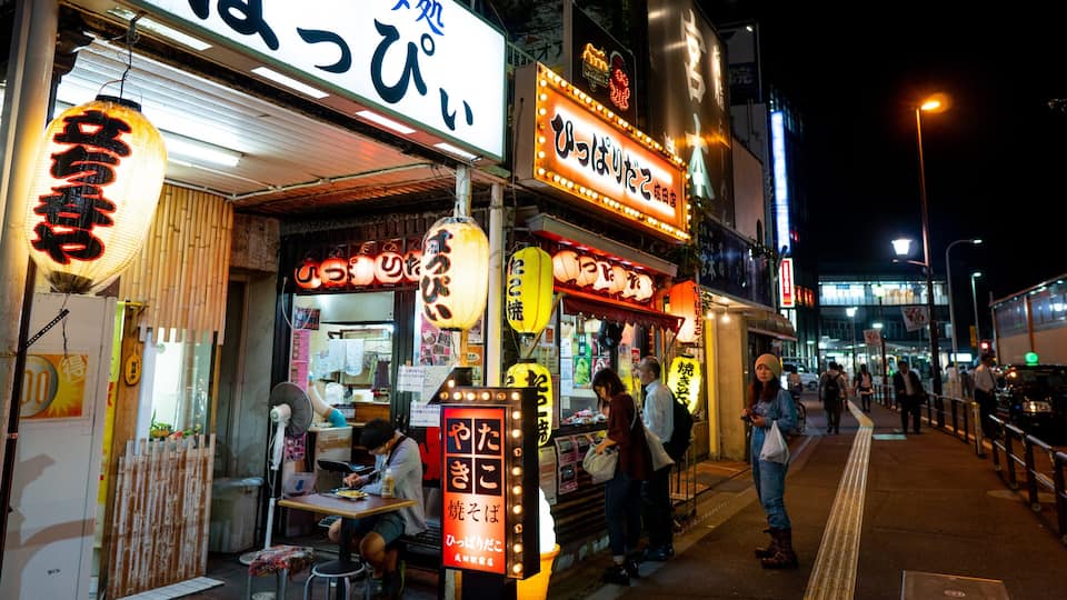 Narita which includes street scenes, signage and night scenes