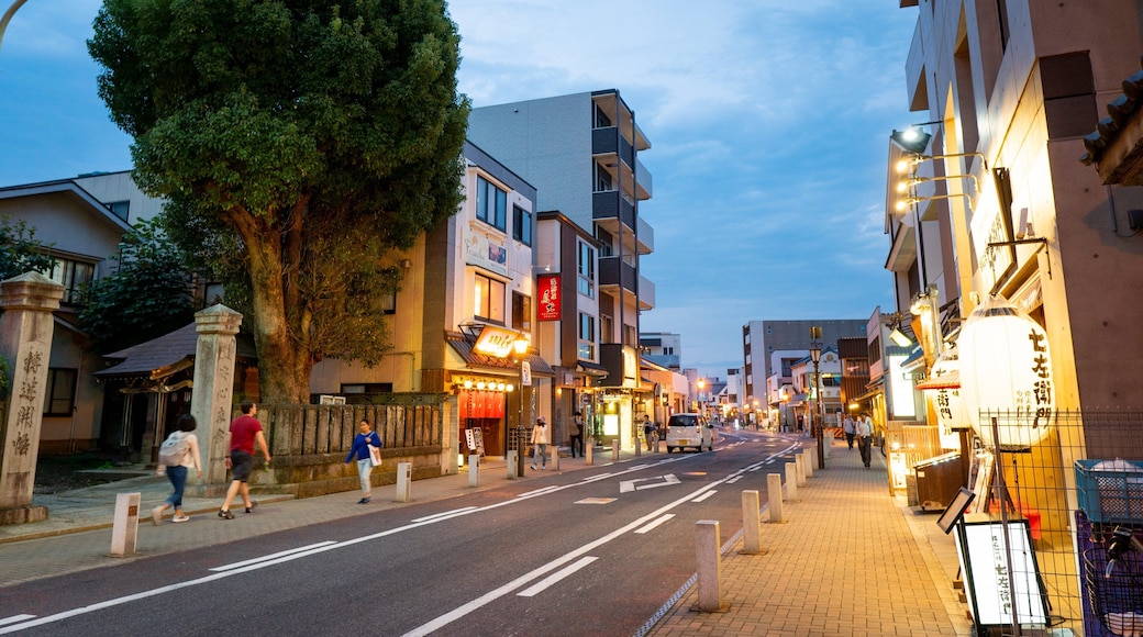 Narita which includes street scenes