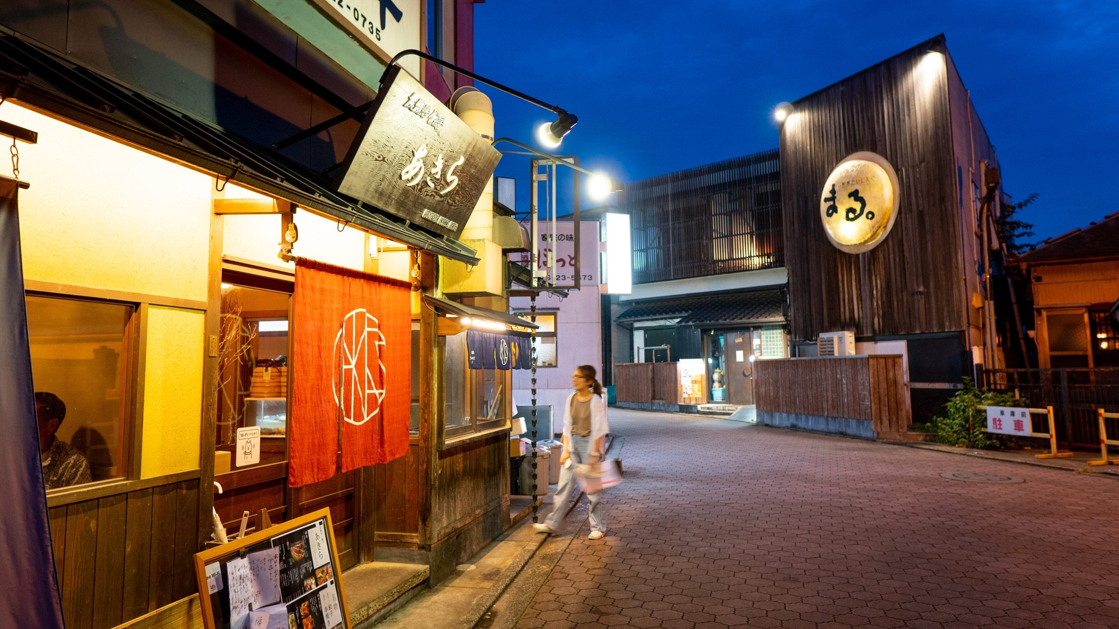 Narita featuring street scenes, night scenes and signage