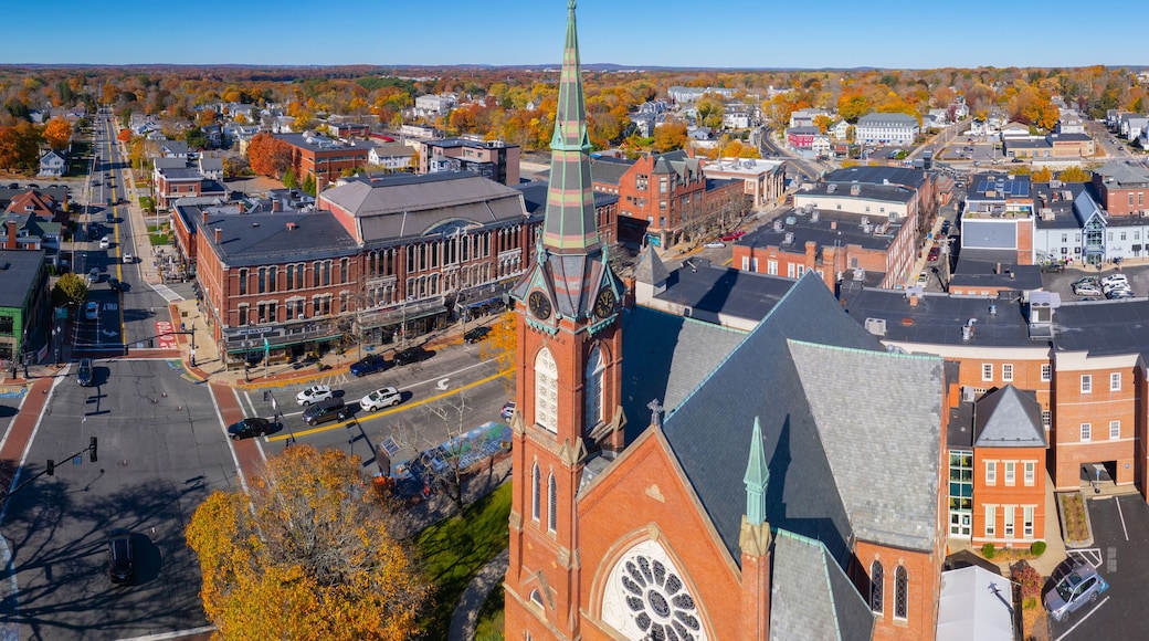 First Congregational Church aerial view in fall with foliage at 2 E Central Street in historic town center of Natick, Massachusetts MA, USA.