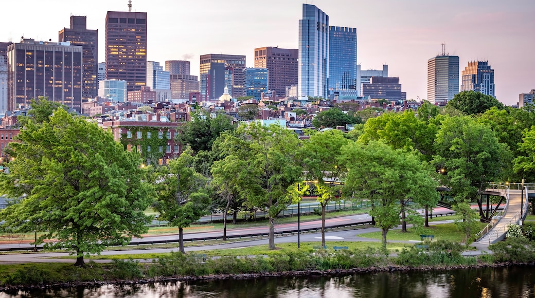 The city of Boston in the summer sun at sunrise at Backbay neighborhood with the Charles River and its mix of contemporary and historic buildings.