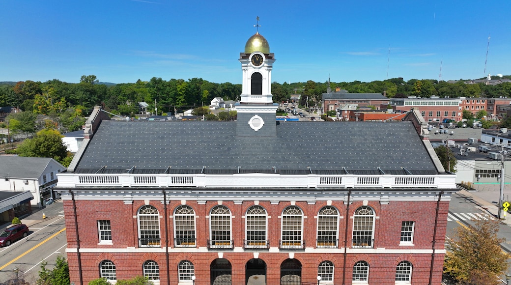 Needham Town Hall aerial view at 1471 Highland Avenue in historic town center of Needham, Massachusetts MA, USA.