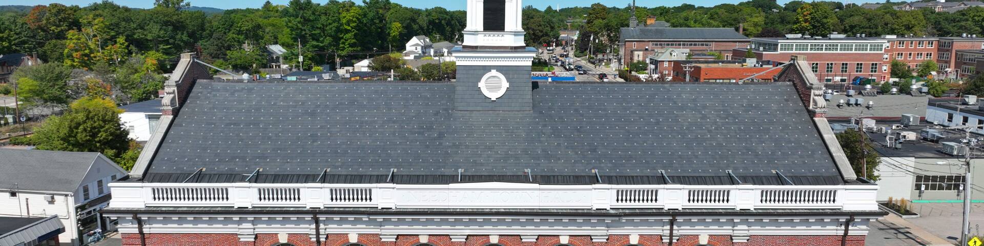 Needham Town Hall aerial view at 1471 Highland Avenue in historic town center of Needham, Massachusetts MA, USA.