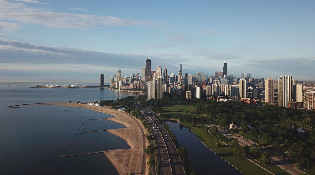panorama of Chicago from the height and lake Michigan, skyscrapers morning sun
