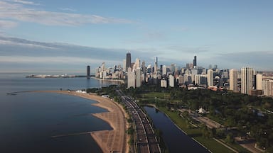 panorama of Chicago from the height and lake Michigan, skyscrapers morning sun