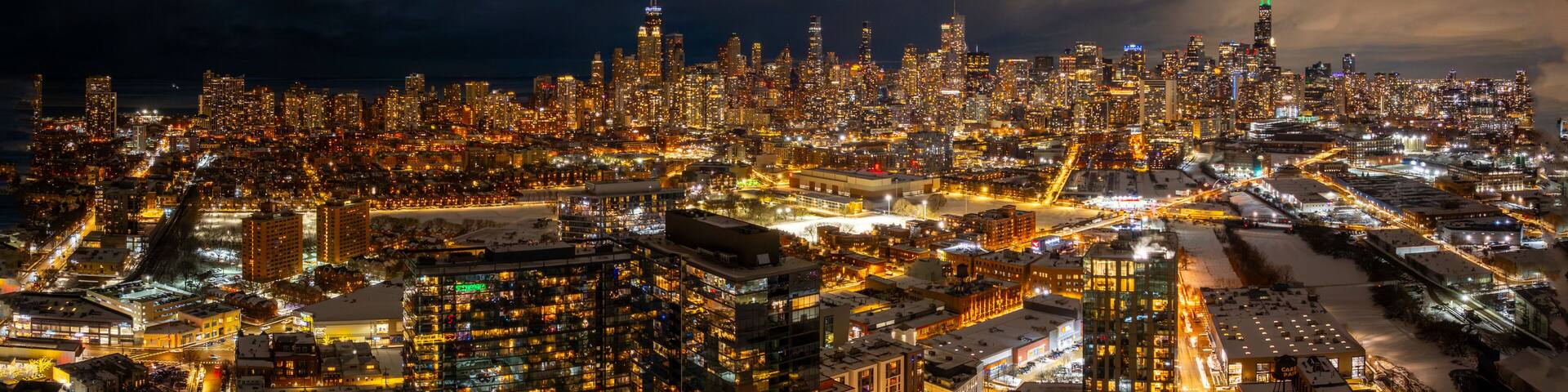 Aerial View of Chicago Skyline and Suburbs at Night - Urban Cityscape February 2026 Chicago, Illinois, Midwest, United States, Windy City.