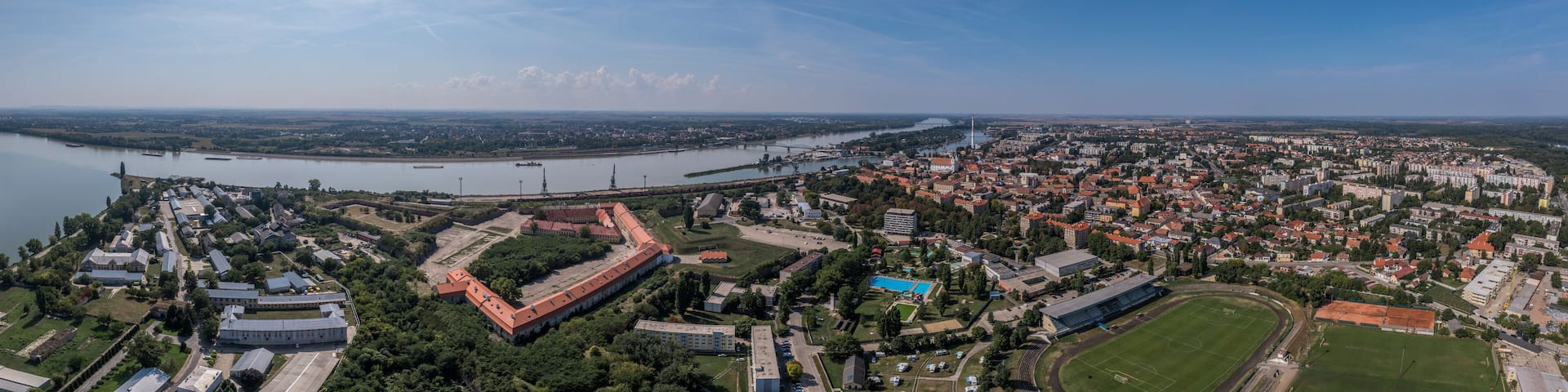 Aerial view of Komarno Komarom border town between Slovakia and Hungary separated by the Danube river with medieval fortress and bridge between the two countries