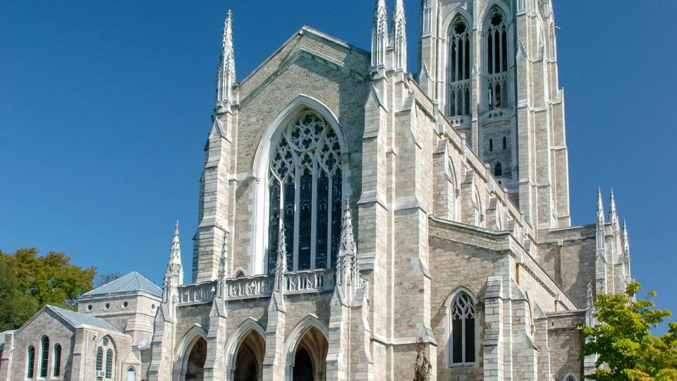 A large Gothic-style cathedral with tall spires and arched windows.