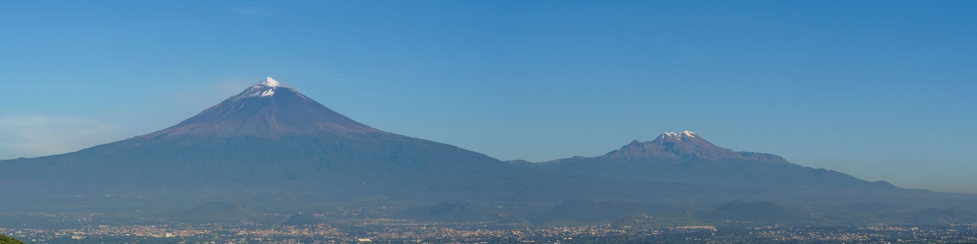 popocatepetl volcano and iztaccihuatl in the Atlixco valley