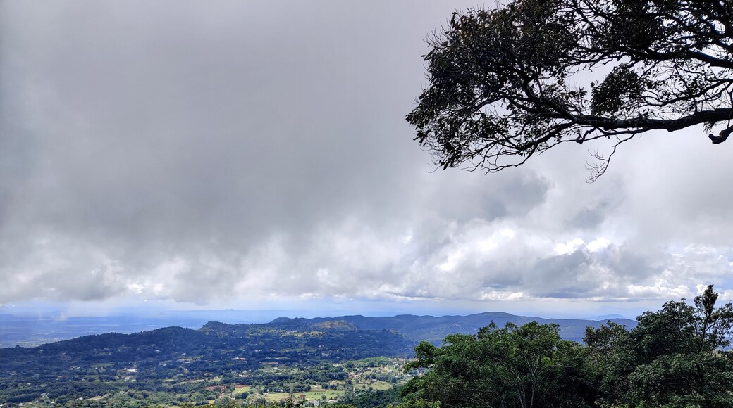Beautiful landscape view of sky and clouds from the top of the hill. South Indian hill station.