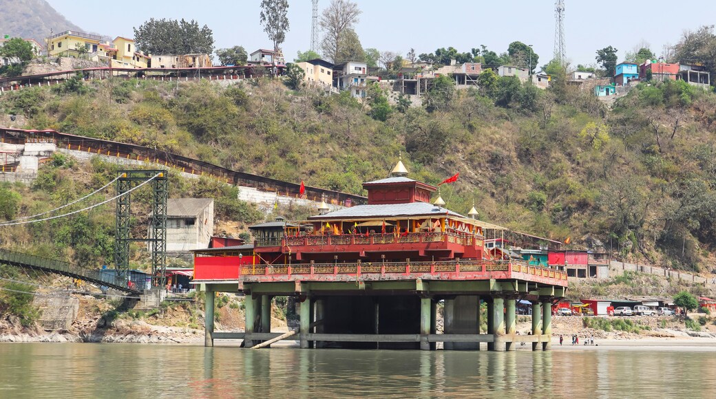 Rear view of the Dhari Devi Temple, situated centrally on the Alaknanda River in Dhari, Srinagar, Uttarakhand, India.