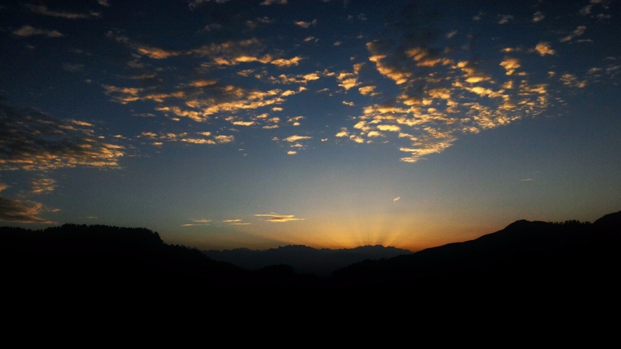 Mountains always call for a view such as this one. My trip to Prashar lake in Himachal Pradesh would not have been successful if i wouldn't have experienced this particular sunrise. It was October 2015 and weather as chilled as it could be. I woke up at 5 Am and waited until 6 Am to witness the first sunrise of my life. Yes , it was the first sunrise of my life and how can i forget , how the rays came into being. For a moment i forgot that we were revolving around the sun and not the other way round. 
#bruisedpassports #BestSunriseEver