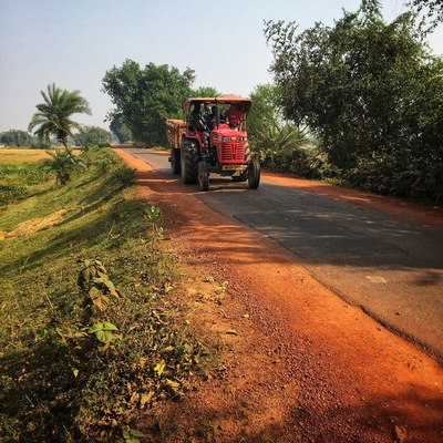 The land of #red soil dotted with red tractor - the Rarh region of Bengal