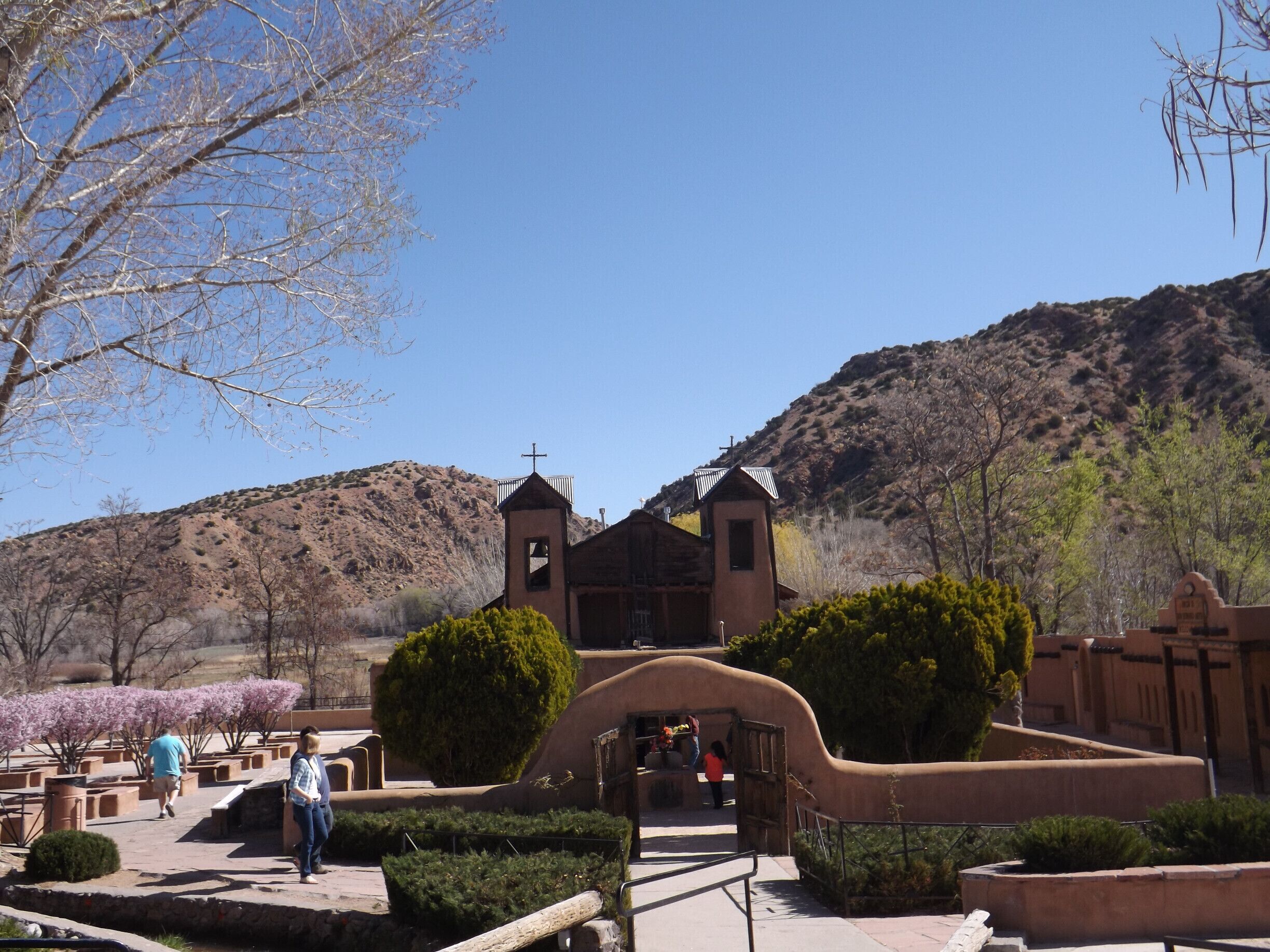 Many visitors to the church take a small amount of the "holy dirt", often in hopes of a miraculous cure for themselves or someone who could not make the trip. The dirt, found in the room known as "pocito" (well) is considered holy because in  this spot the crucifix of Our Lord of Esquipulas was found by Bernardo Abeyta in 1810. Since then thousands of pilgrims and visitors have come to El Santuario de Chimayo searching for spiritual, emotional and physical healing. No pictures are allowed inside the Sanctuary.
