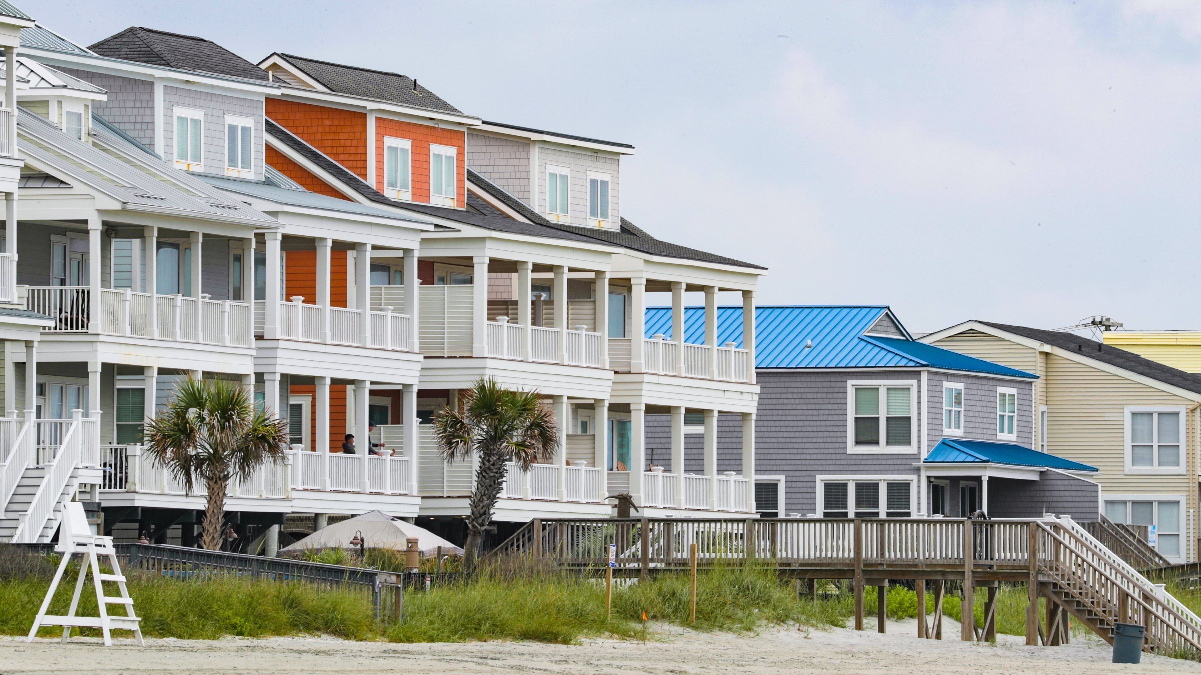 North Myrtle Beach featuring a house, a sandy beach and a coastal town
