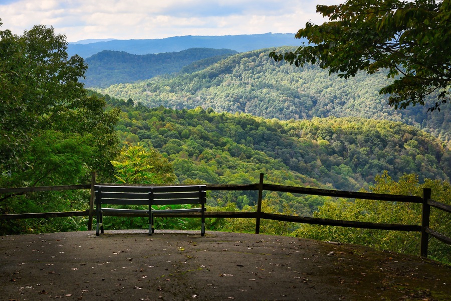 A park bench at a beautiful mountain overlook in West Virginia, USA.