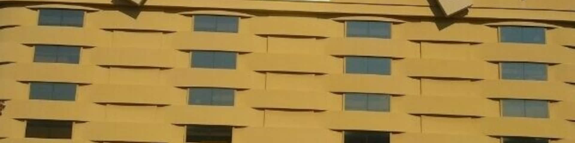 A six story office building shaped like a giant overpriced Longaberger wicker basket.