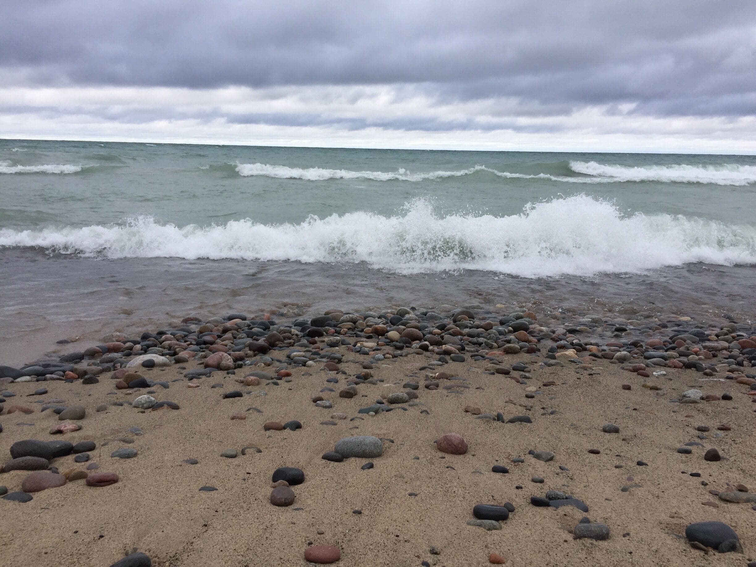 Agate picking after a long night of storms and gale warnings on Lake Superior. 