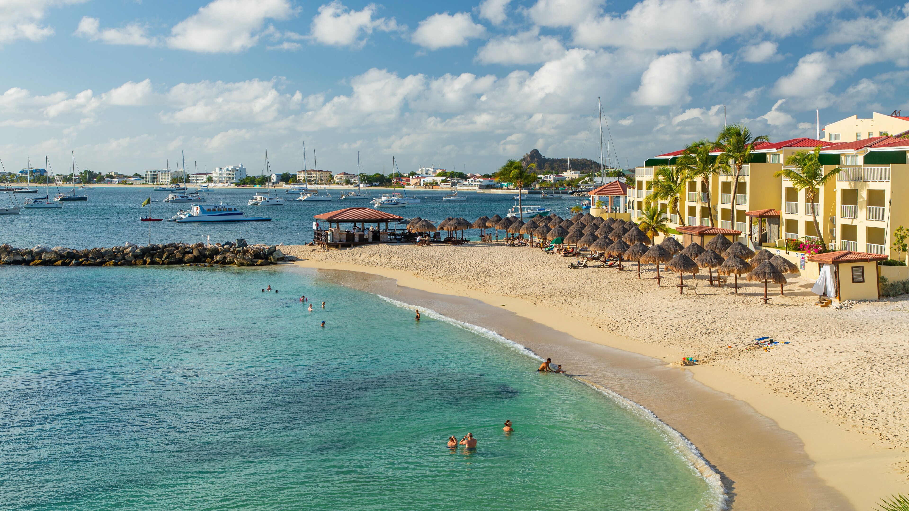 Simpson Bay showing a coastal town, swimming and general coastal views