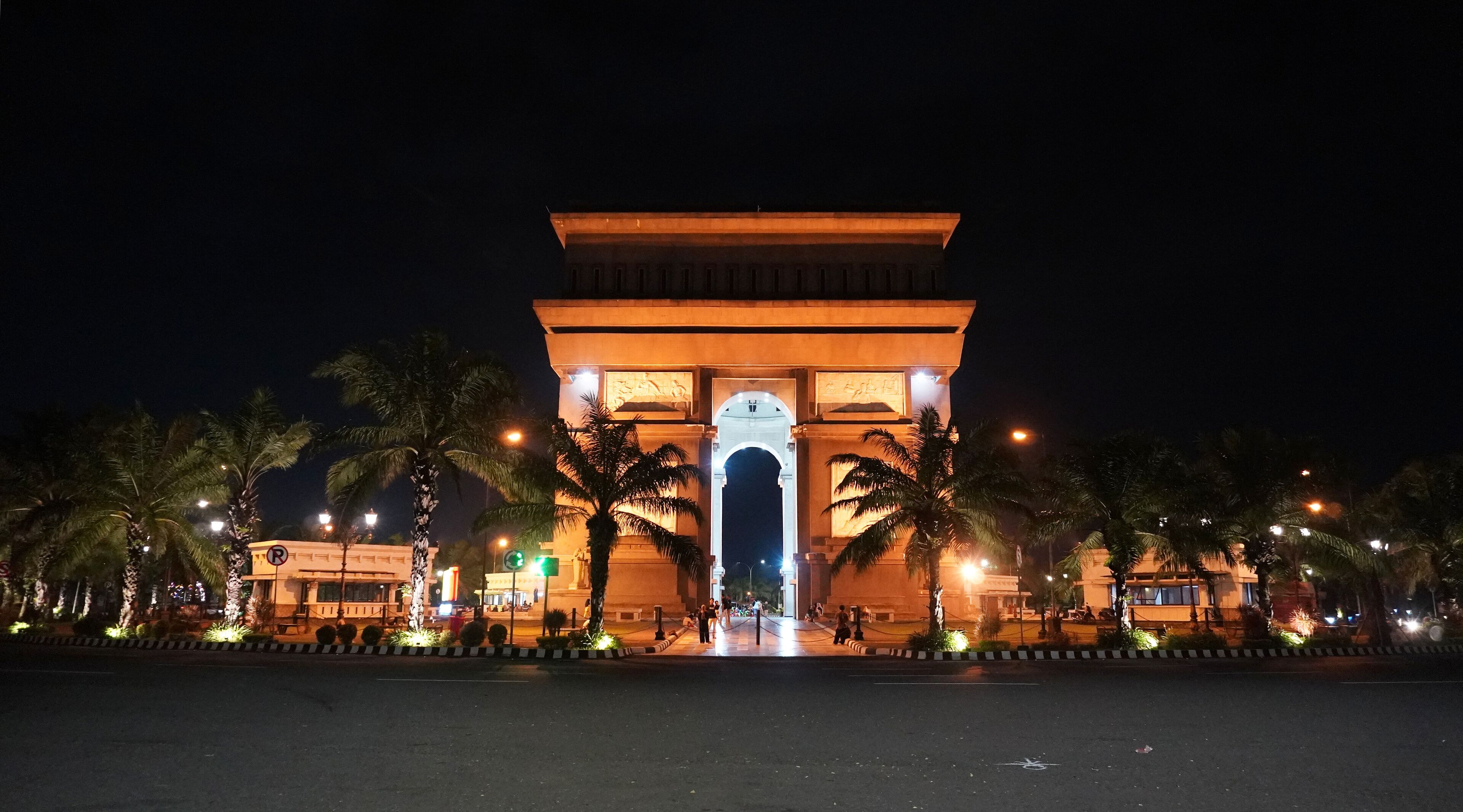 The Simpang Lima Gumul Monument, located at the intersection of five roads in Kediri, Indonesia, at night. One of the iconic tourist attractions in Kediri Regency, Indonesia.