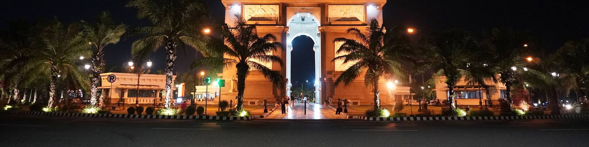 The Simpang Lima Gumul Monument, located at the intersection of five roads in Kediri, Indonesia, at night. One of the iconic tourist attractions in Kediri Regency, Indonesia.