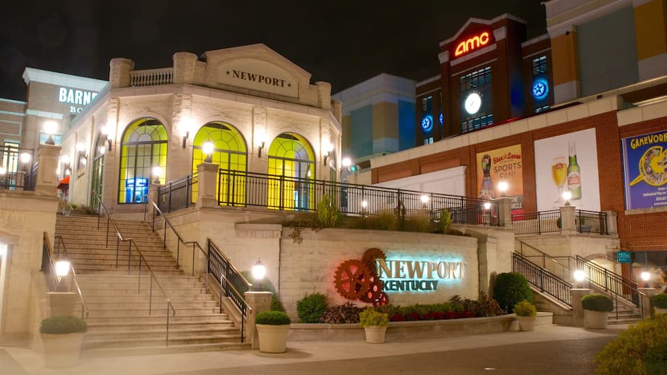 A historic building with arched windows and a sign reading "NEWPORT KENTUCKY".