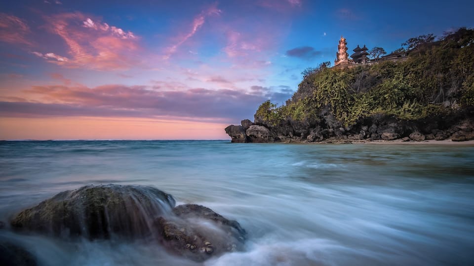 This is a great spot for a sunrise shot. It's next to The Mulia Resort at Nusa Dua, taken from the wharf. The Mulia is a private resort and I think the beach is private, but you can walk along the pathway from the public beach, next to The Mulia. It's only about a 250 metre walk from the public entrance.