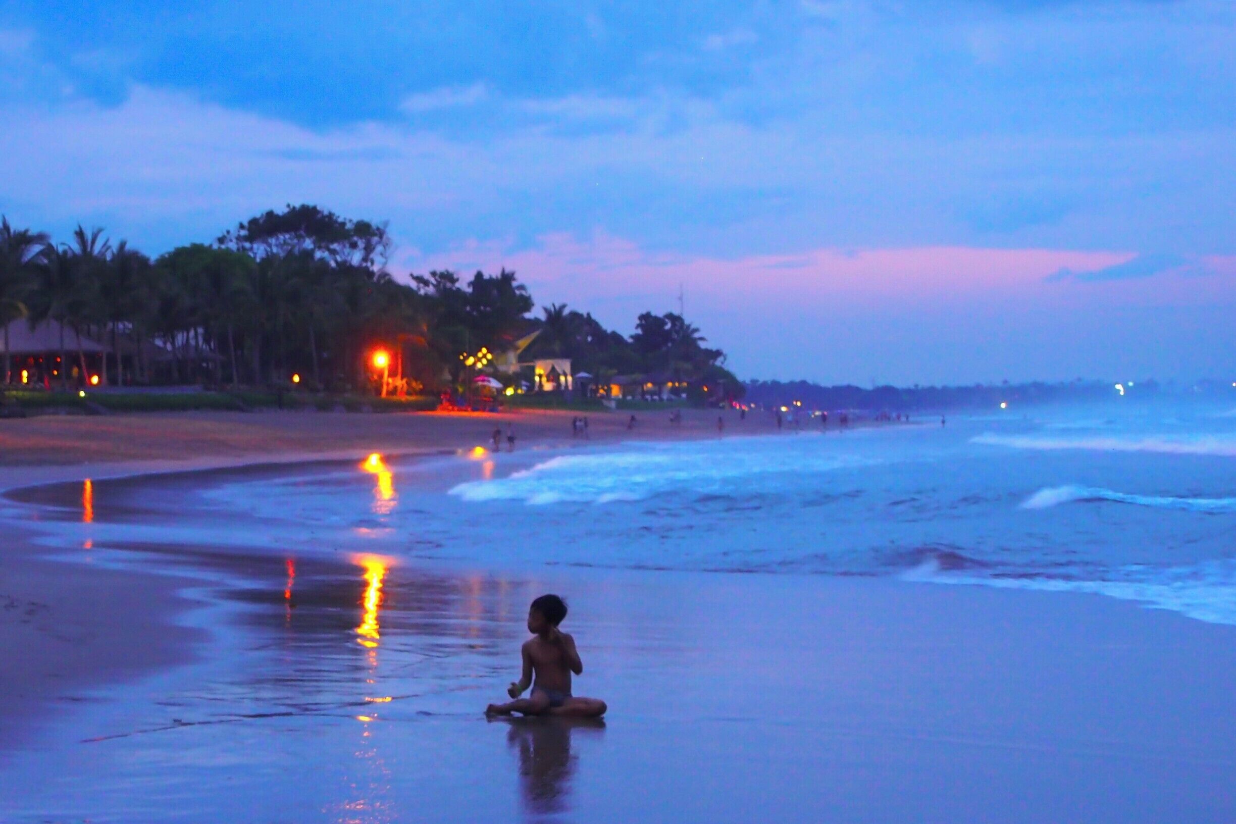 Seminyak Beach in Kuta, Bali is a good place to watch the sunset in one of their many beach bars. The waves were enormous so not good for swimming, at least during the rainy season.