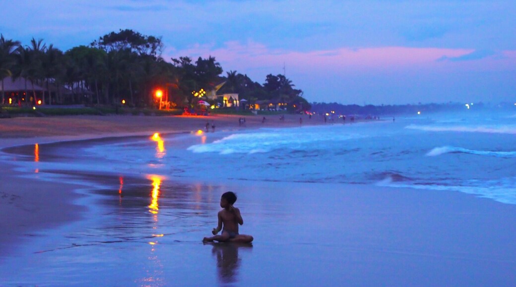 Seminyak Beach in Kuta, Bali is a good place to watch the sunset in one of their many beach bars. The waves were enormous so not good for swimming, at least during the rainy season.