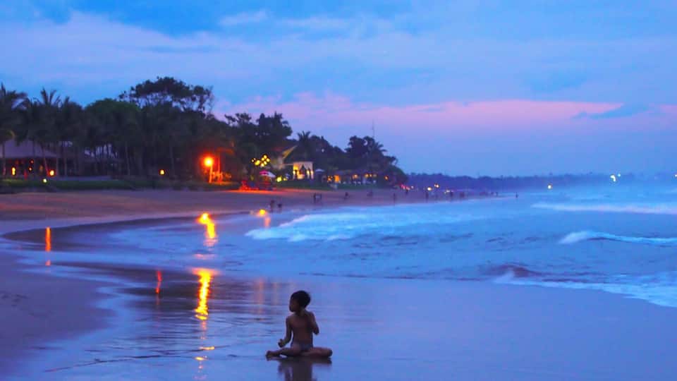 Seminyak Beach in Kuta, Bali is a good place to watch the sunset in one of their many beach bars. The waves were enormous so not good for swimming, at least during the rainy season.