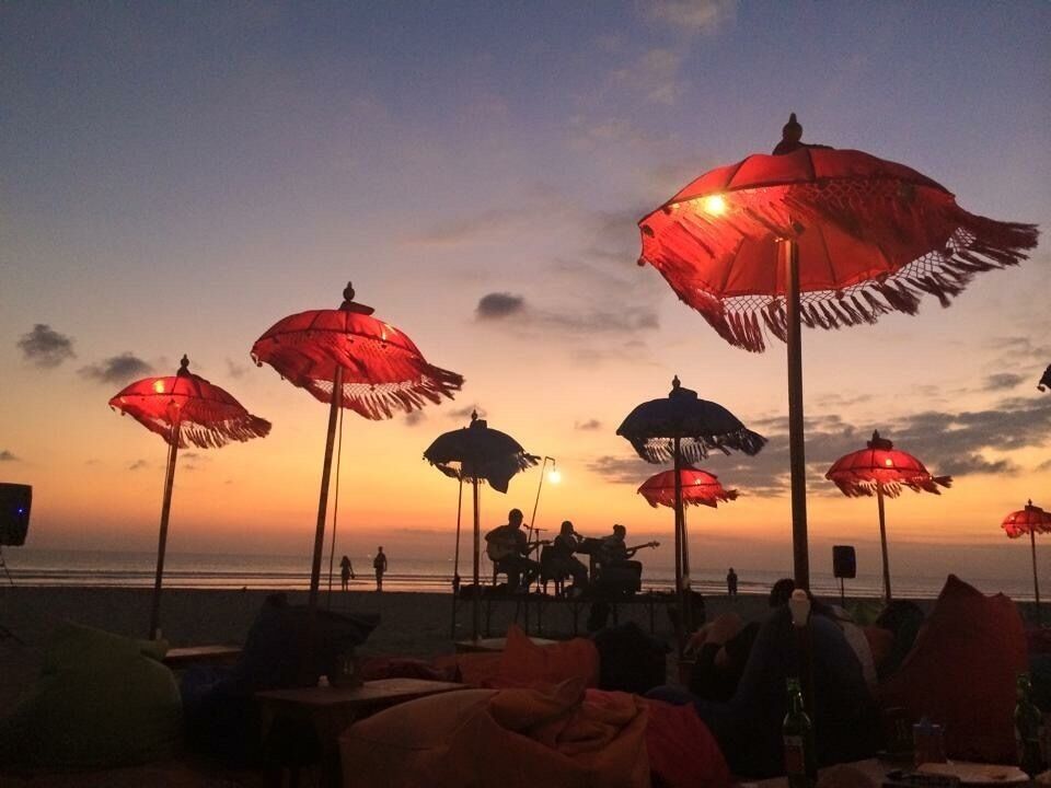 #BeachBound beautiful sunset on Seminyak Beach. Relax on a bean bag, grab a drink and listen to live music.