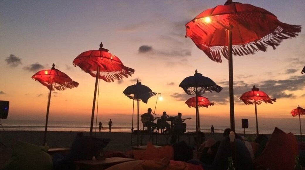 #BeachBound beautiful sunset on Seminyak Beach. Relax on a bean bag, grab a drink and listen to live music.