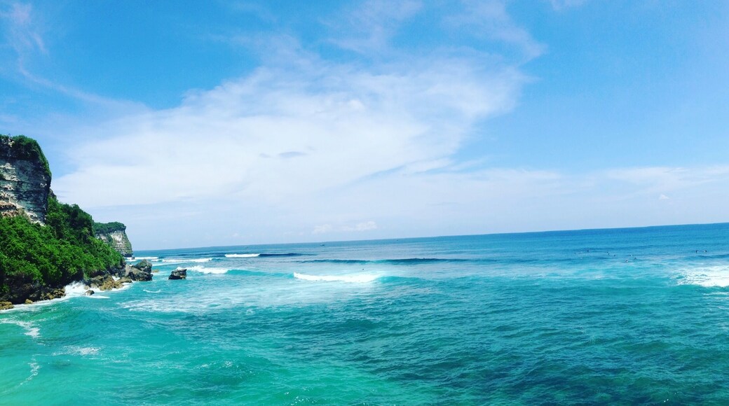 Just sitting there, watching the surfers breaking the Waves.