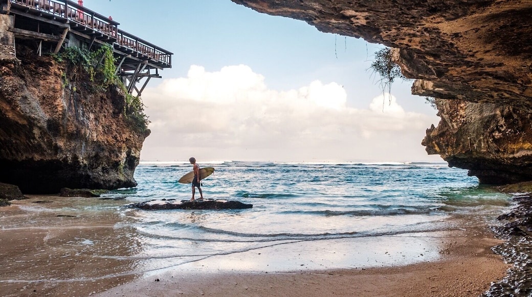 This photo symbolizes so much to me of what surfing is about. Discovering hidden beaches, rising up with the first sun light of the day and getting excited about meeting the element where everything comes from.