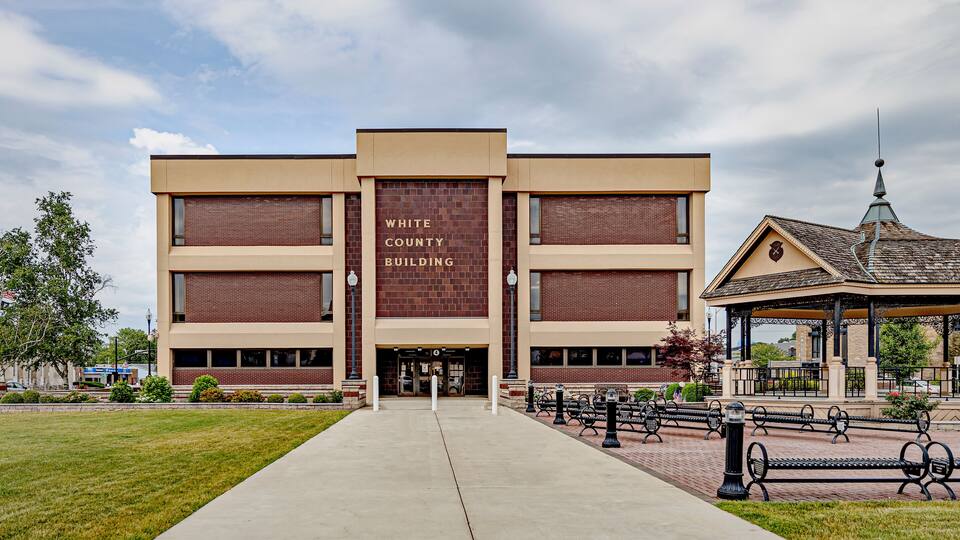 The White County Building with a brick facade and a central entrance.
