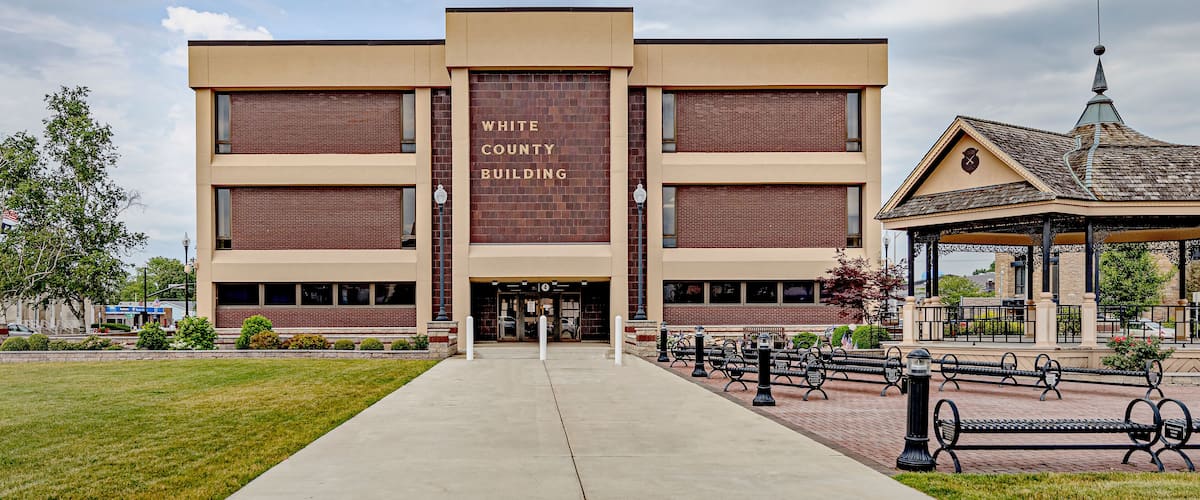 The White County Building with a brick facade and a central entrance.