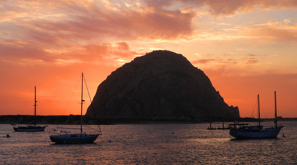 spectacular morro rock and sailboats at sunset in san luis obispo county on the central california coast
