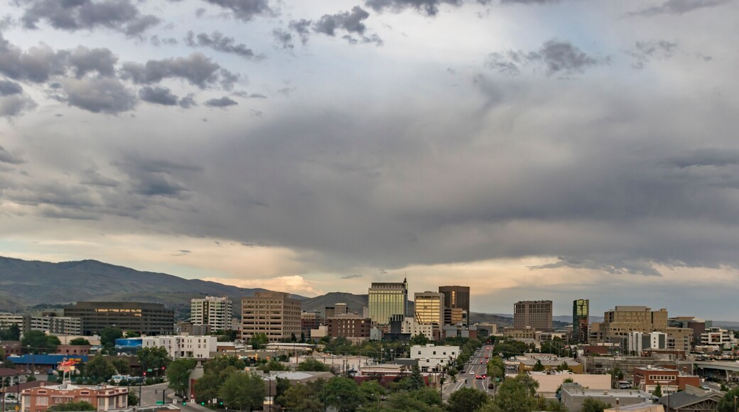 Boise, Idaho. Cityscape with a view from the west at sunset in summertime. Downtown streets and skyscrapers and the Boise Foothills.