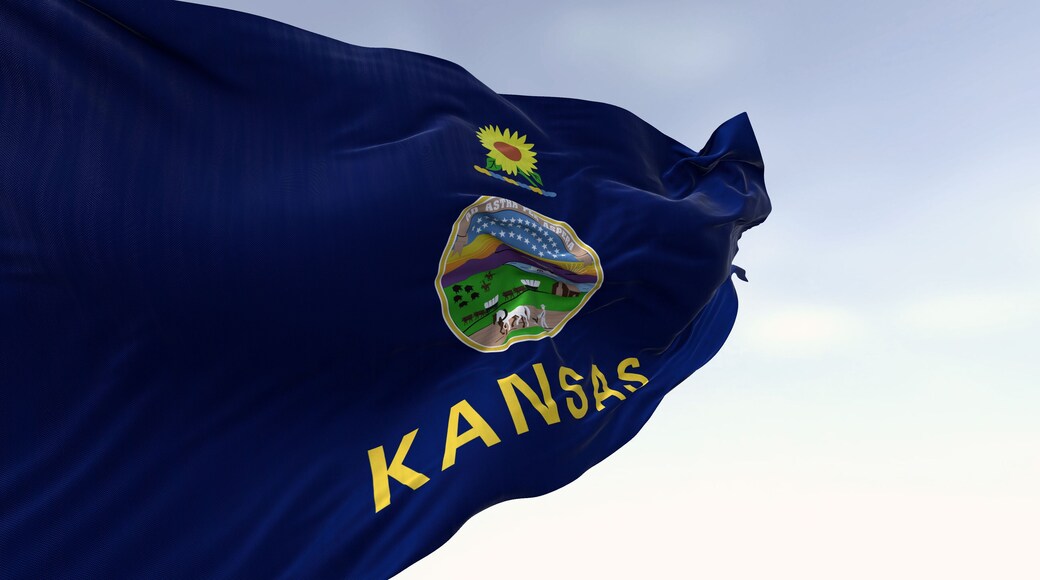 Close-up of Kansas state flag waving in the wind on a clear day