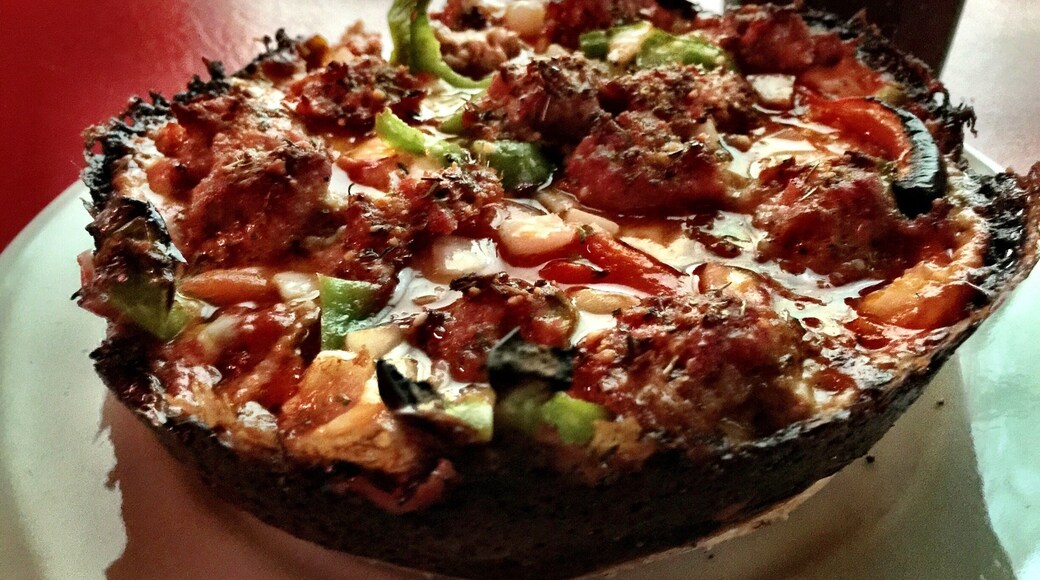Delicious deep dish pizza, they have a $5 lunch special for a personal pan deep dish pizza, a total steal! Love the local dive bar atmosphere.