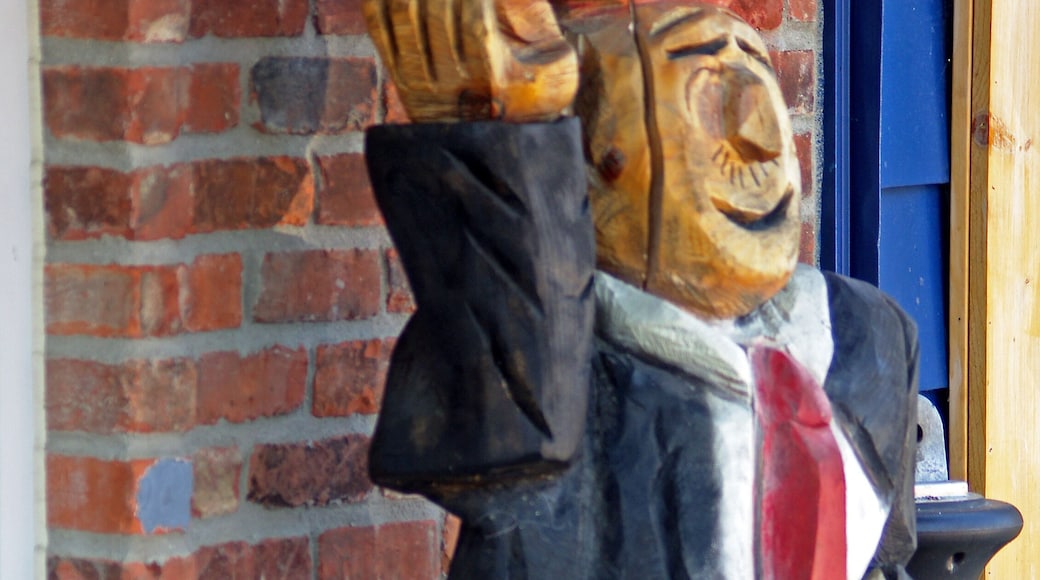 This is a carving of J. Wellington Wimpy, generally known as "Wimpy" is a character in the old Popeye comic strip who is famous for the line "I'll gladly pay you Tuesday for a hamburger today".