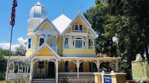AKA The Donnelly House
John P. Donnelly came to Mount Dora in 1879 from Pittsburgh, PA. He married Annie McDonald Stone in 1881 and built this Queen Anne style house in 1893 as a gift to her. He was among the founders of the local yacht club, and served as the city´s first mayor in 1910. The Donnelly House, now owned by Mount Dora Lodge #238, F&AM, was listed in the National Register of Historic Places on April 4, 1975.
Mount Dora is a cute town on the banks of Lake Dora surrounded by antiquing opportunities and is just a short drive to the massive Renningers Antique Market
