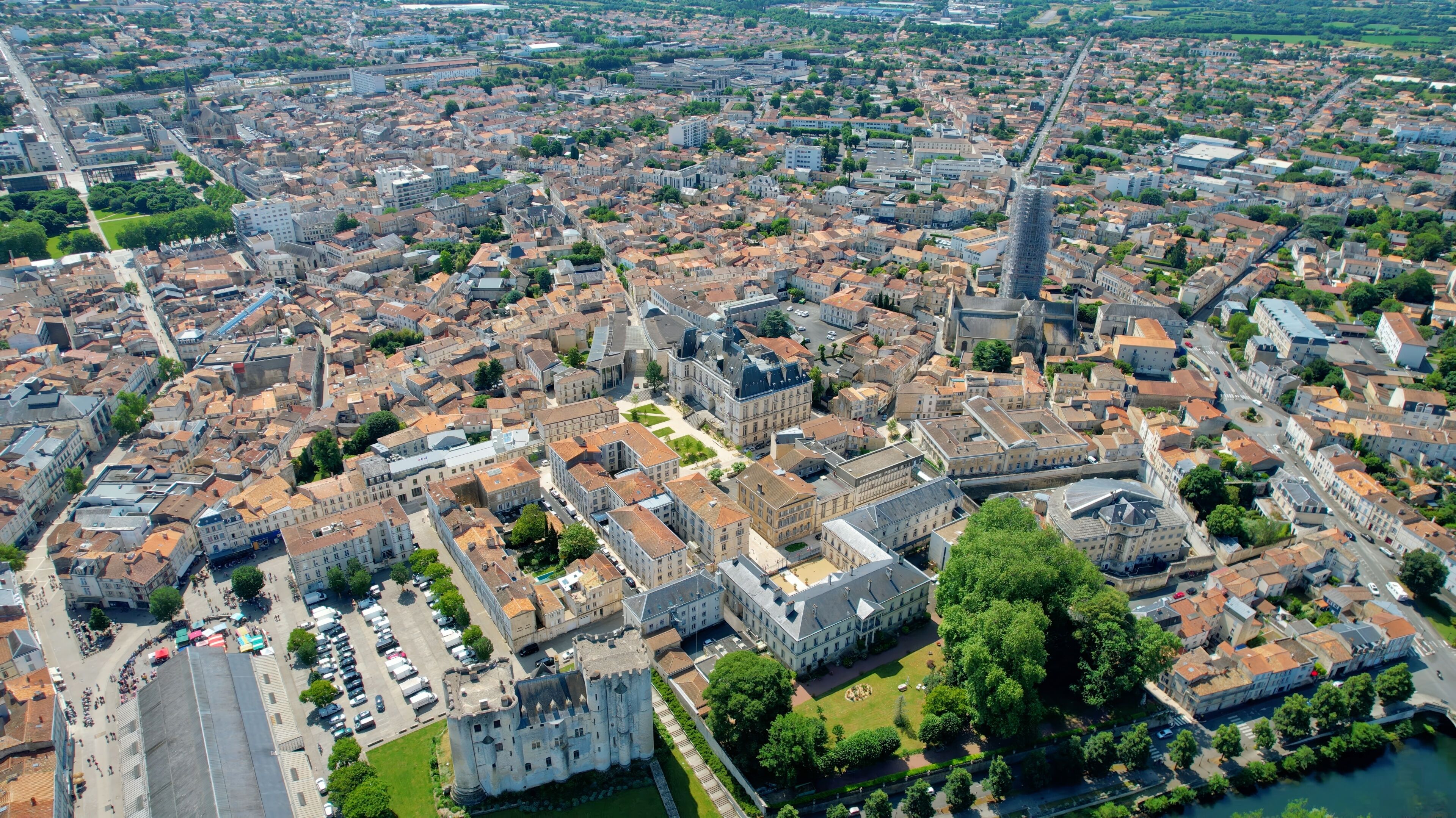 Aerial panorama view around the old town in the city Niort in France, on a sunny summer noon