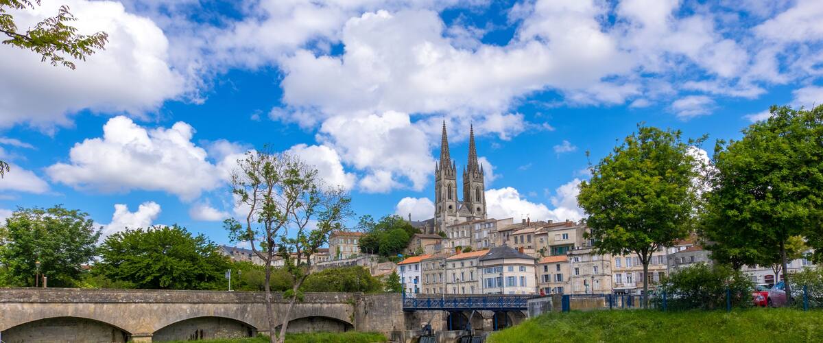 A view of Niort from the quay of Sevre Niortaise river, Deux-Sevres, Poitou-Charentes region, France